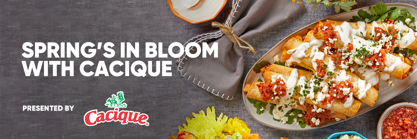 Cacique food items arranged on a table with branded packaging visible.