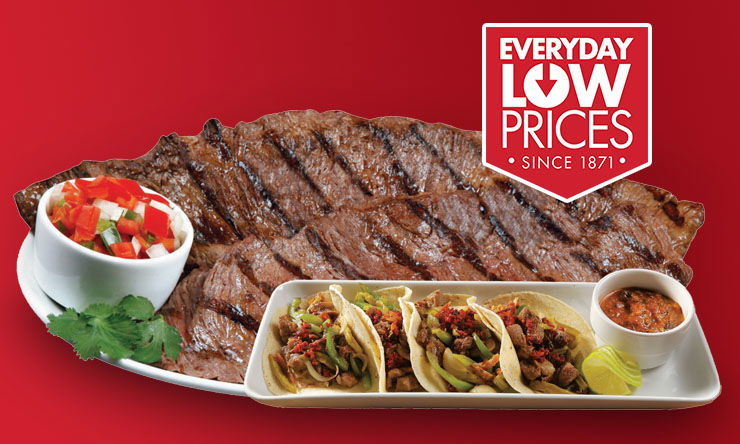 Raw beef loin roast displayed on a tray with marbling visible in the meat.