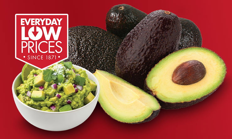 Whole ripe avocado with dark green skin