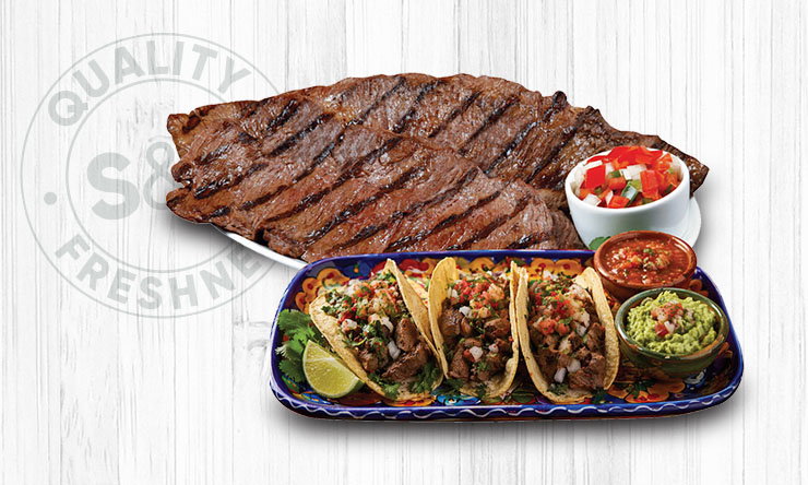 Beef flap meat steak in clear plastic tray with label, thin cut and deep red color