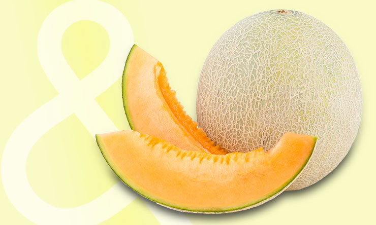 Ripe cantaloupes with tan, netted rinds and round shape.