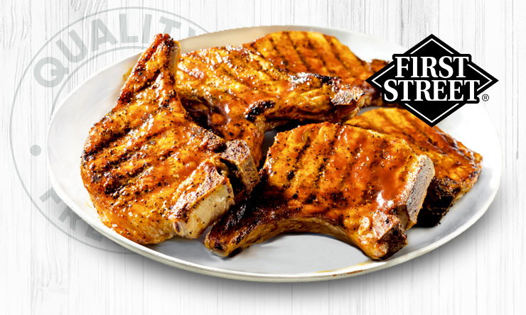 Fresh assorted pork chops, featuring cuts of pork ready for cooking